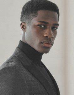 A portrait of a handsome man wearing corporate attire 